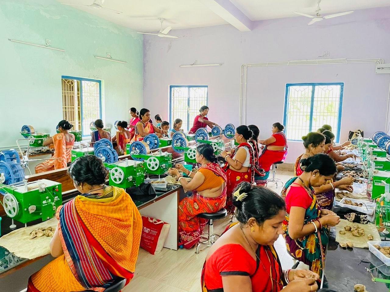 Women training on Tasar reeling machines